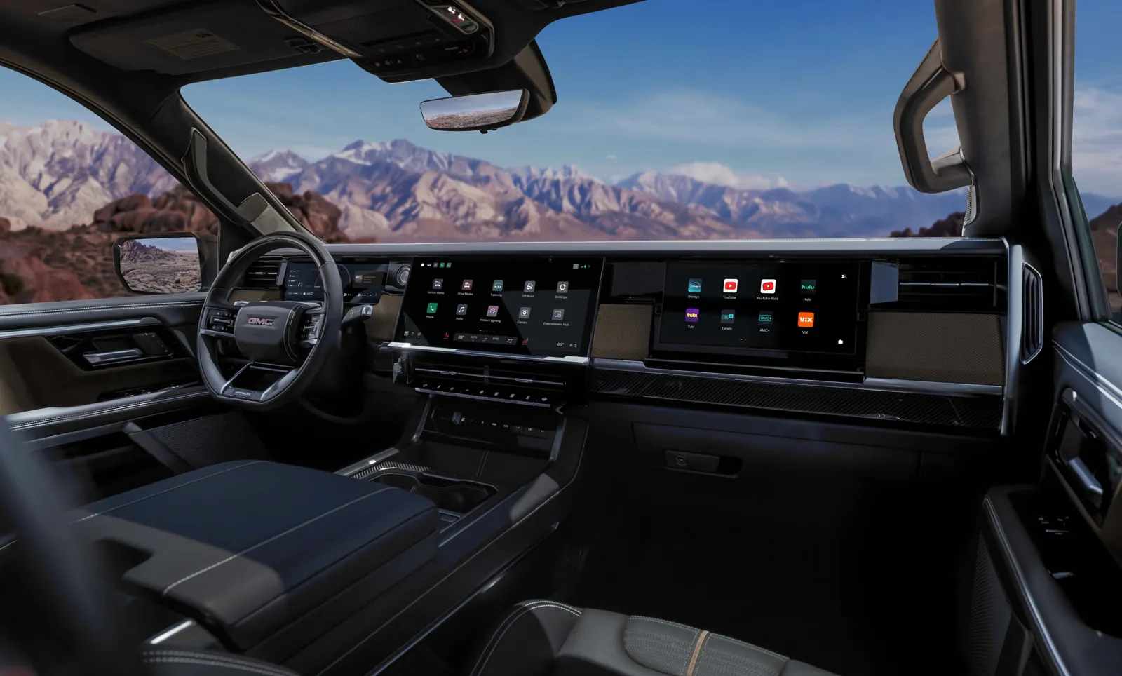 2027 GMC Sierra 1500 AT4X dashboard with center screen and 11.5-inch passenger display